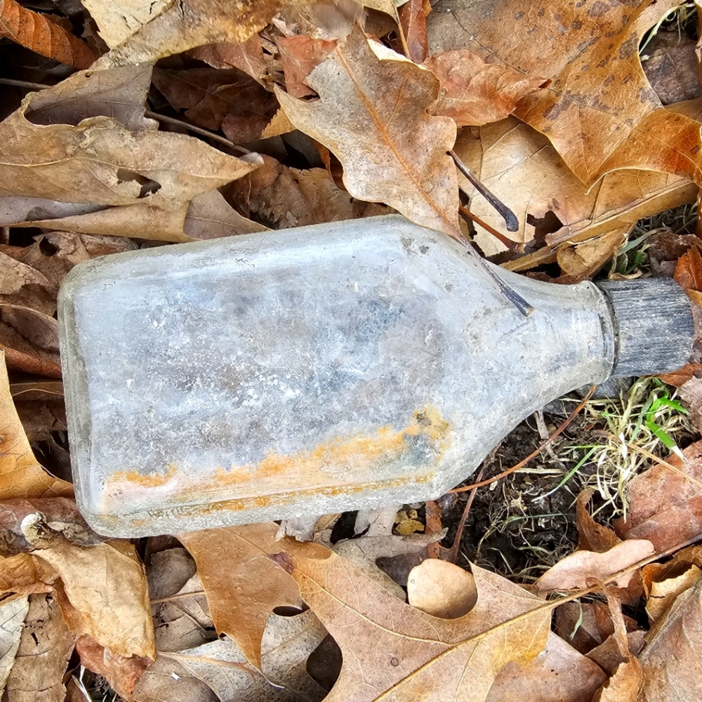 Vintage Glass Bottle with Black Cap